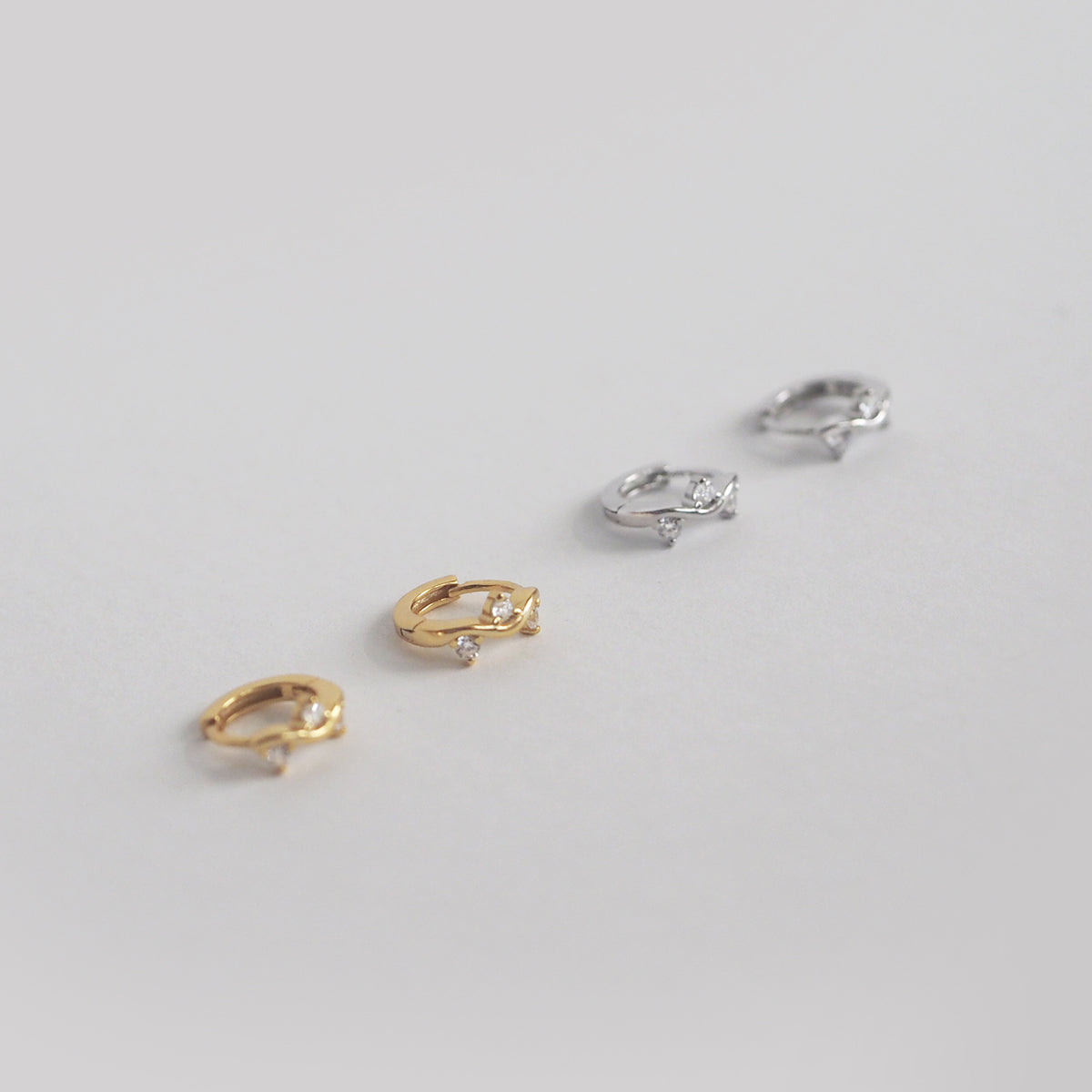 Nataly Wavy Cubic Zirconia Hoop Earrings