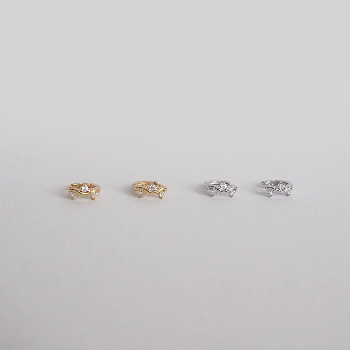 Nataly Wavy Cubic Zirconia Hoop Earrings