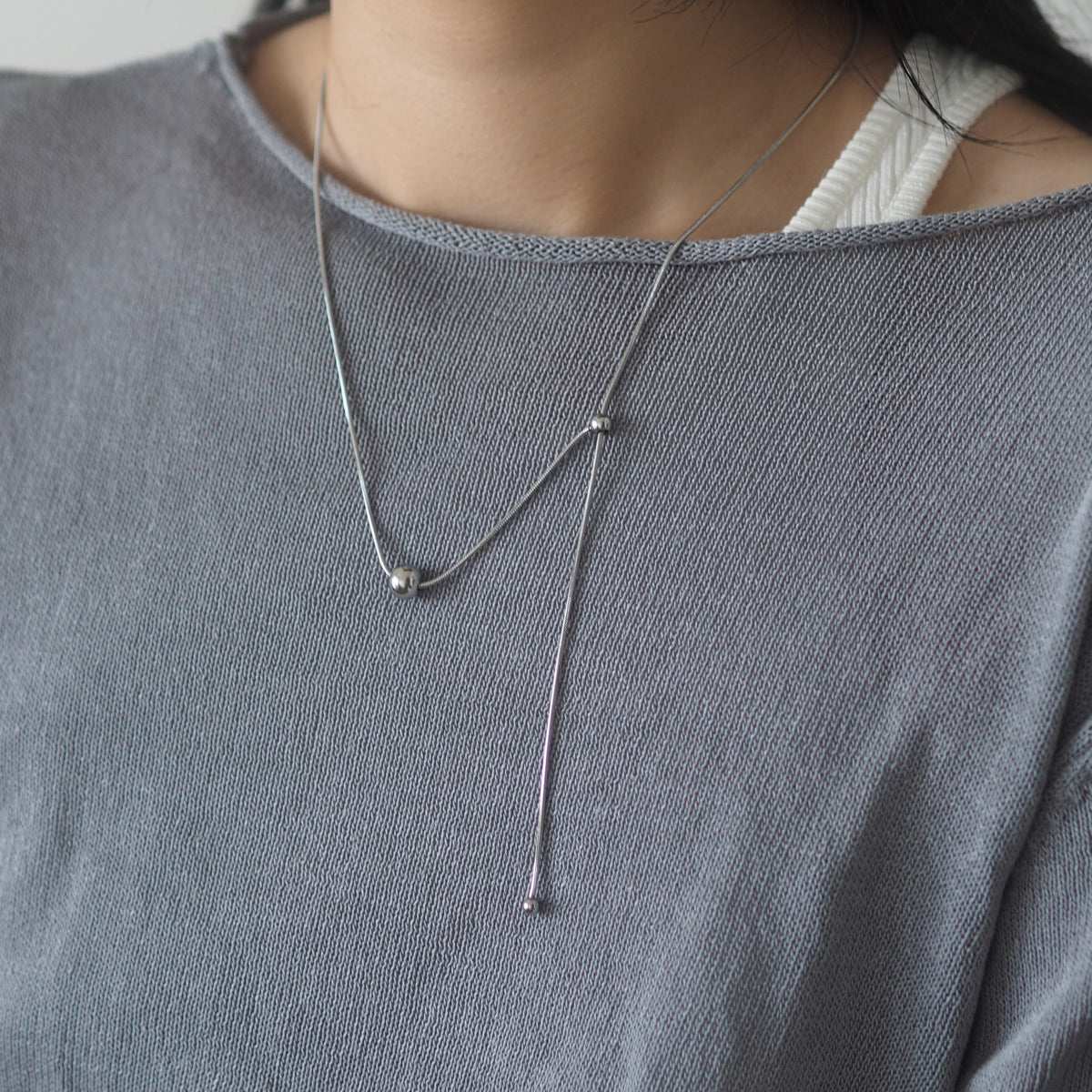 Nisha Drawstring Ball Necklace