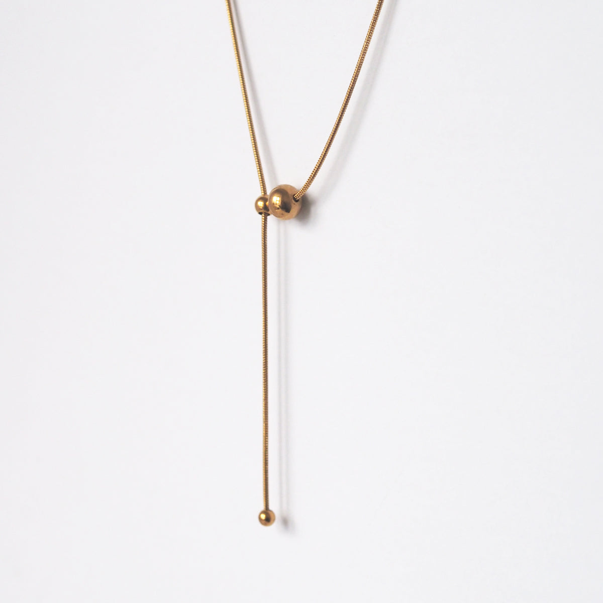 Nisha Drawstring Ball Necklace - éclater jewellery