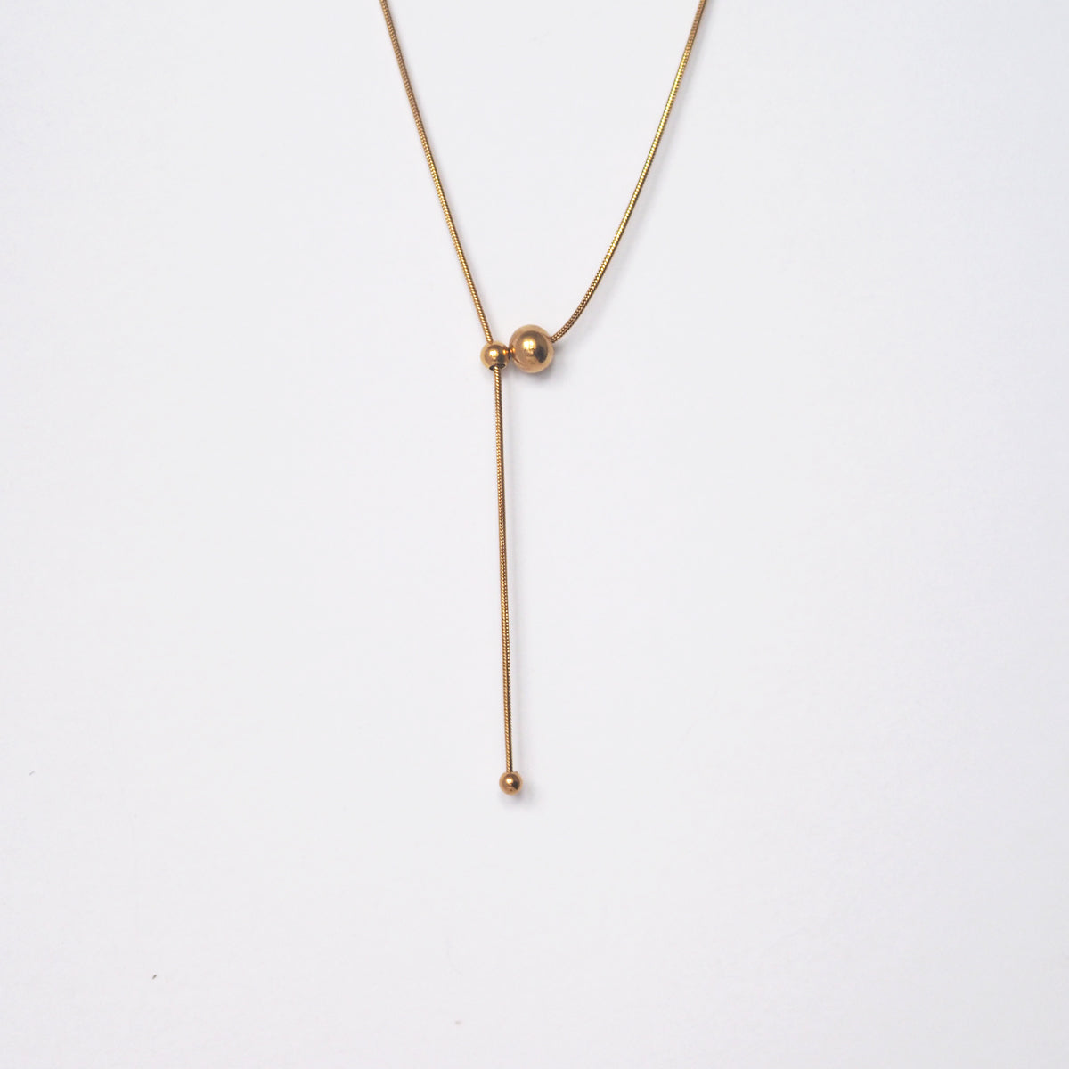 Nisha Drawstring Ball Necklace - éclater jewellery