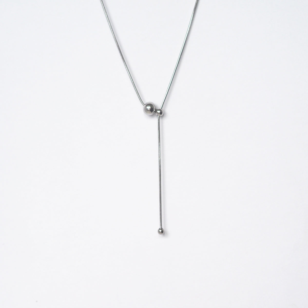 Nisha Drawstring Ball Necklace - éclater jewellery