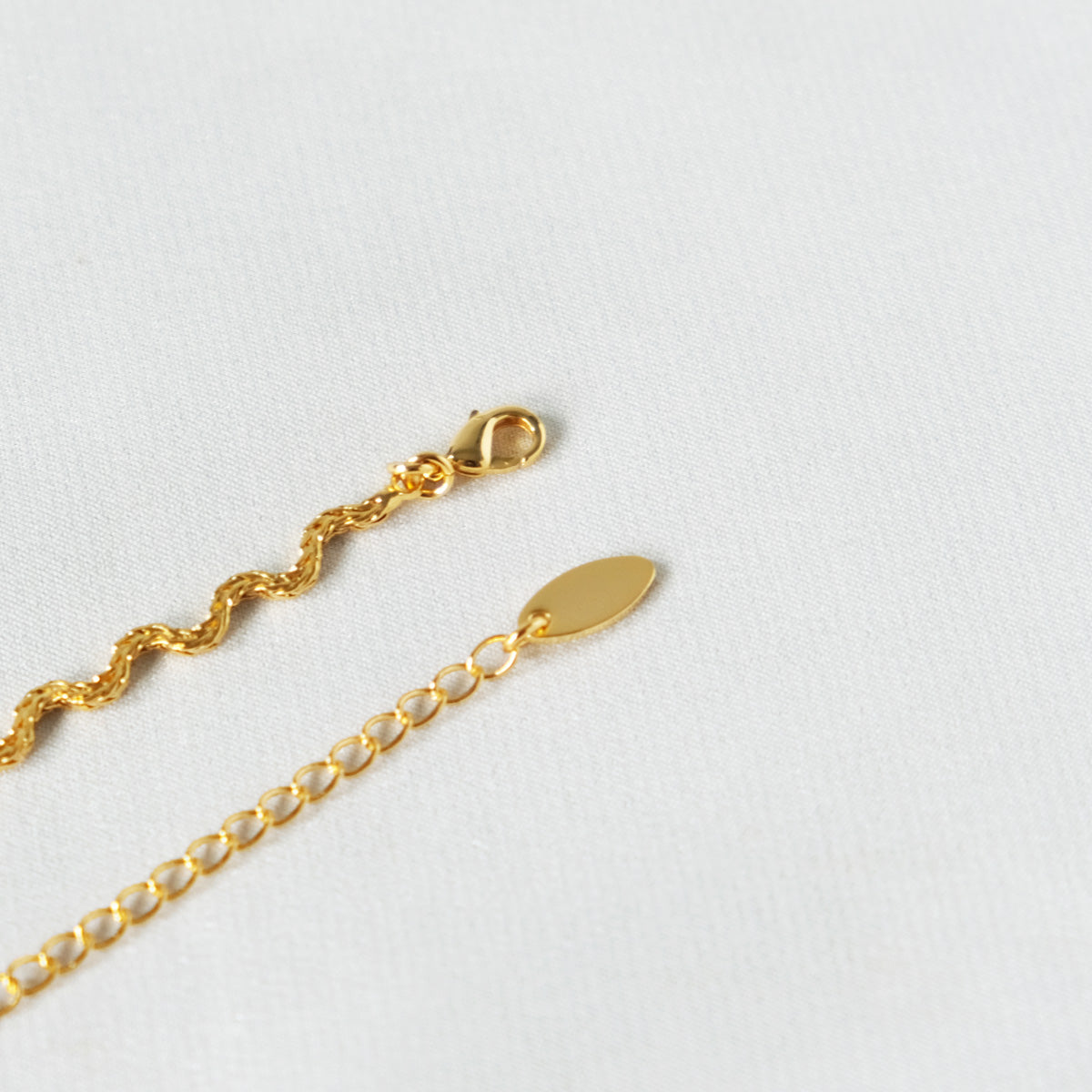 Merle Wave Cubic Zirconia Necklace - éclater jewellery